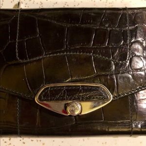 Furla tri-fold wallet.